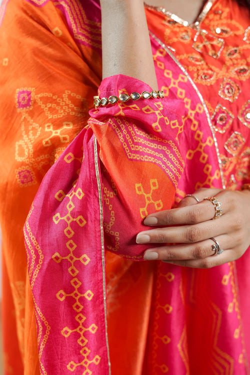 Pink and Orange Crepe Bandhani Print Suit Set.
